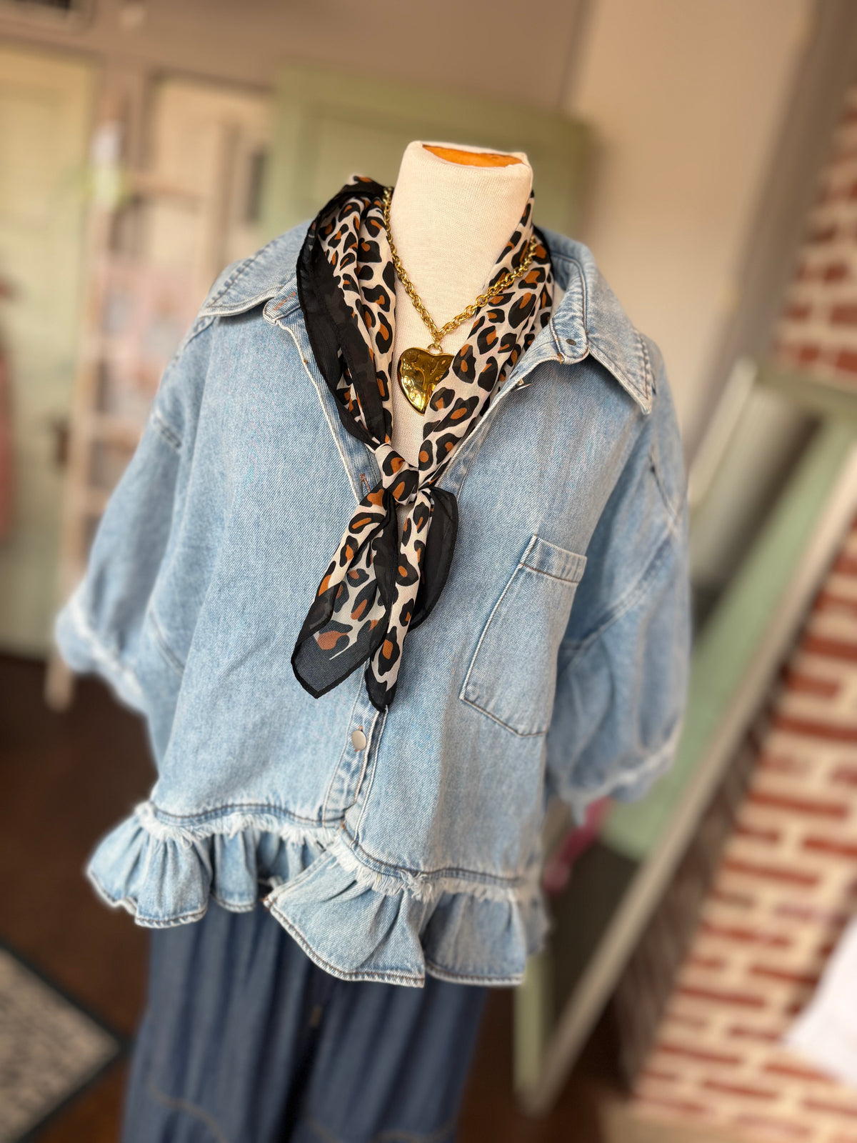 Denim Ruffle Bottom Button Up